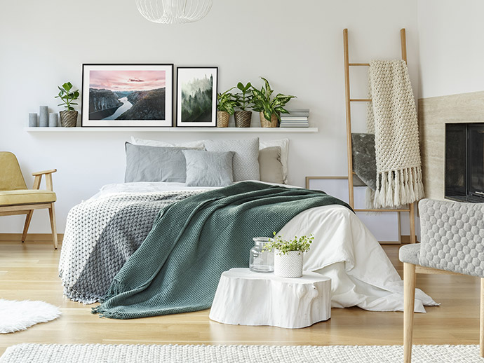 Gestaltung der Wand hinter dem Bett